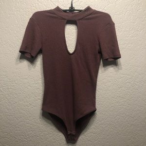 Purple, or mauve, onesie with neck line